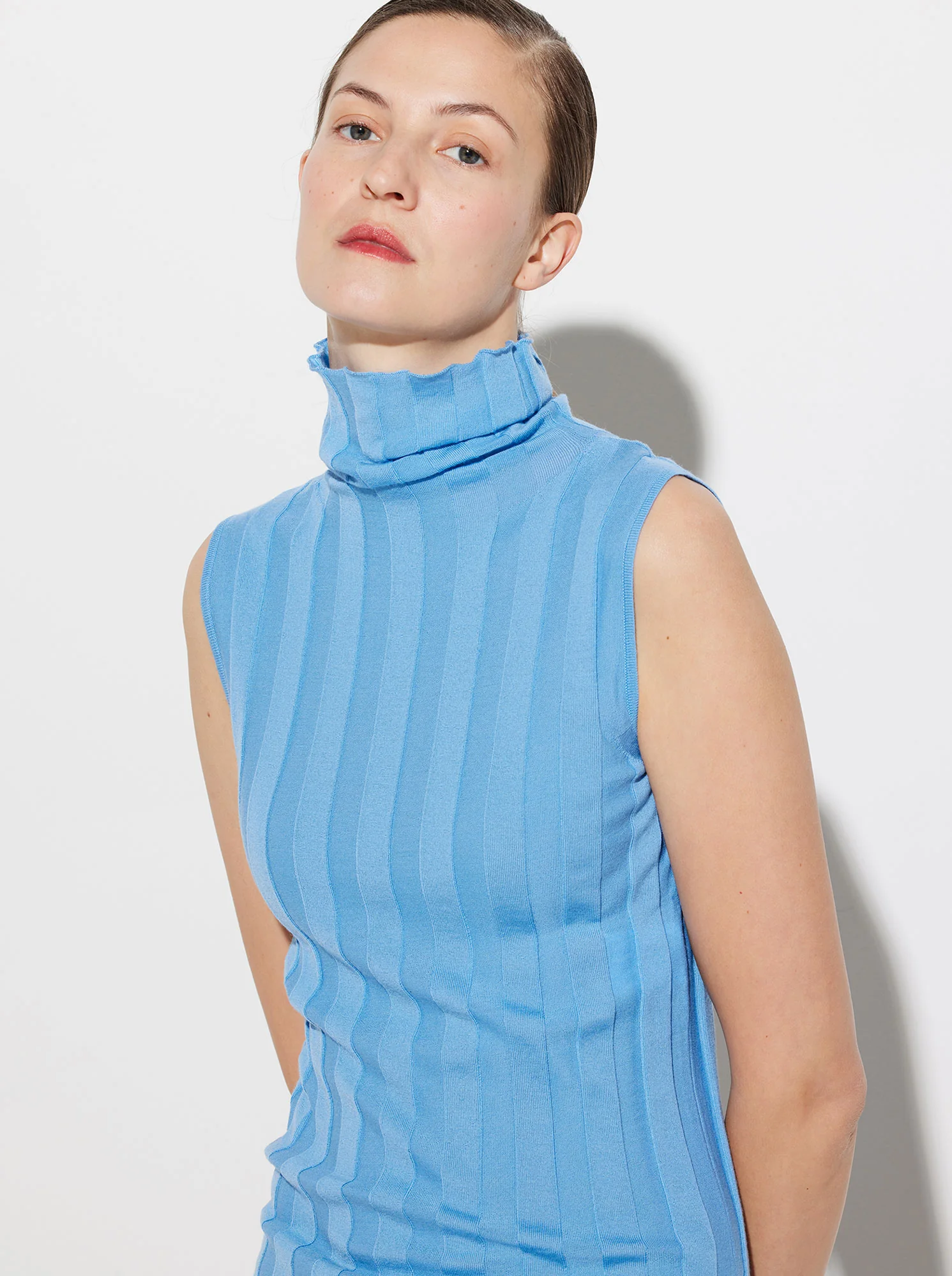 ROMY Sleeveless Turleneck in Indigo Blue - Image 4